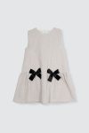 Coco-Dress-Beige-–-Black-Bow-Depan