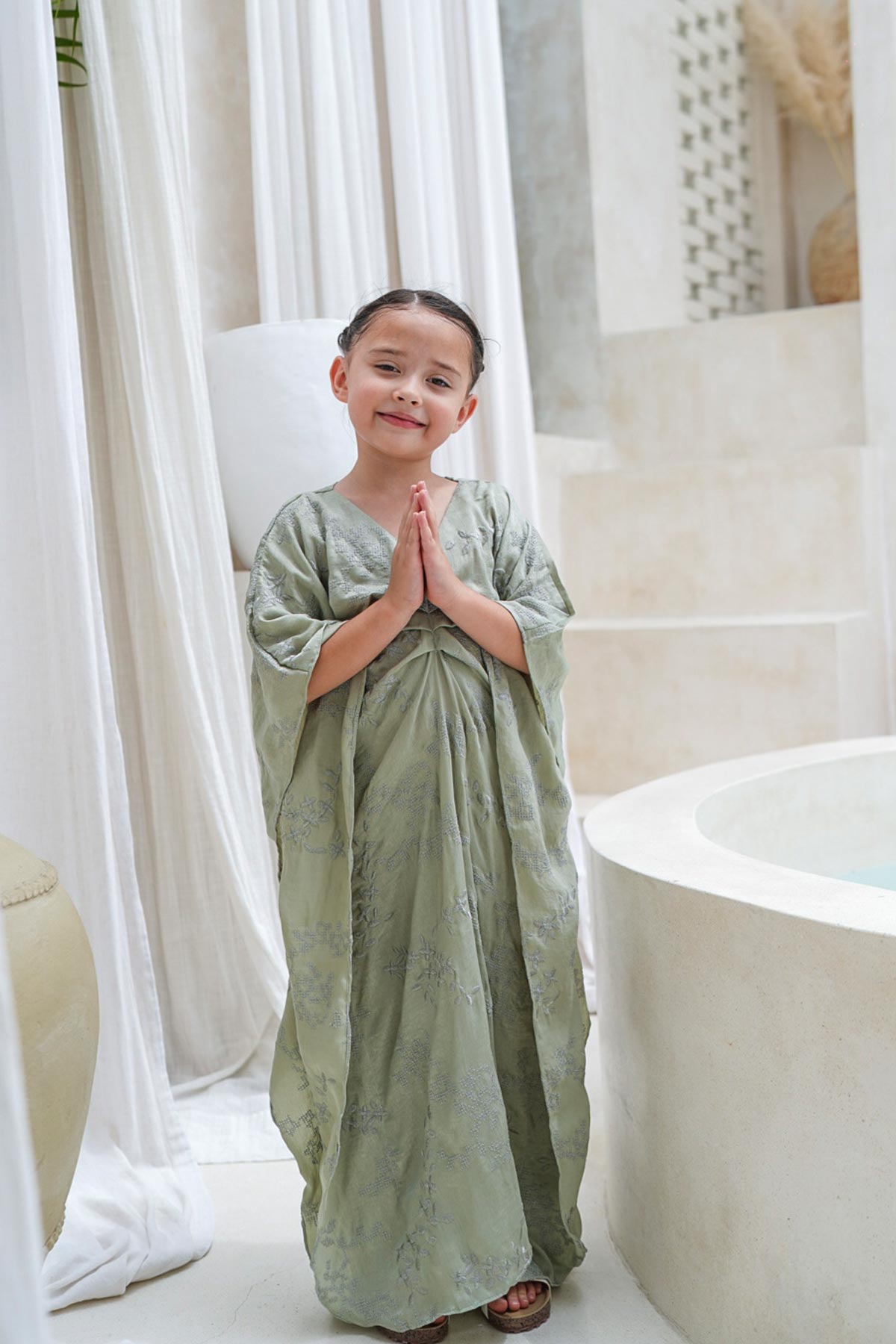 aisha kaftan dress sage green on model 3 Aisha Kaftan Green 1