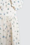 Ursulla-Dress-Blue-Flower-On-MOdel